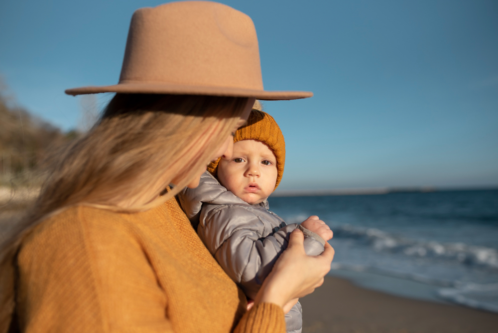 neonato in vacanza con genitori